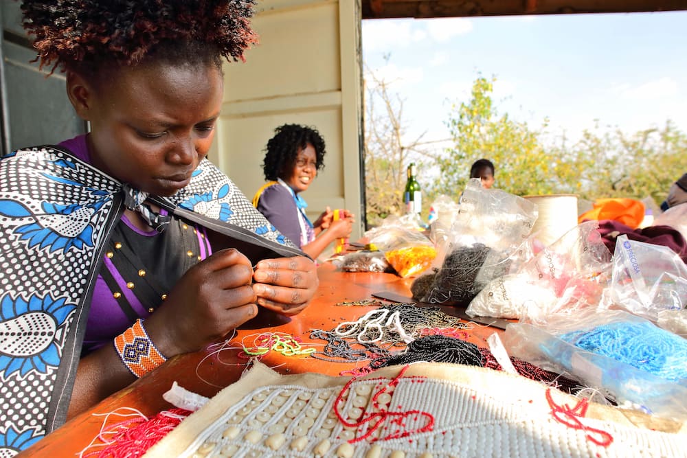 Maasai ladies creating beaded products