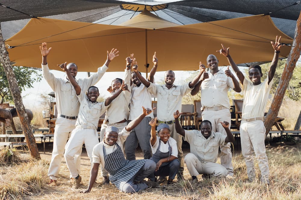 The Usangu Expedition Camp staff family are all smiles at the end of their first season of operation.