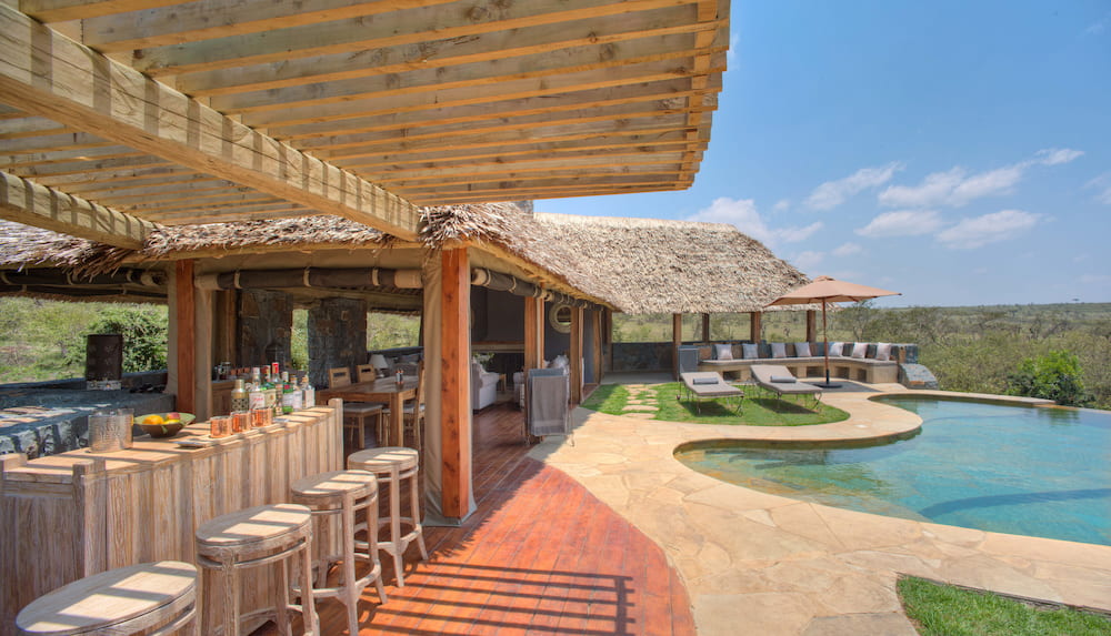 The poolside bar and lounge area in Naboisho Camp.