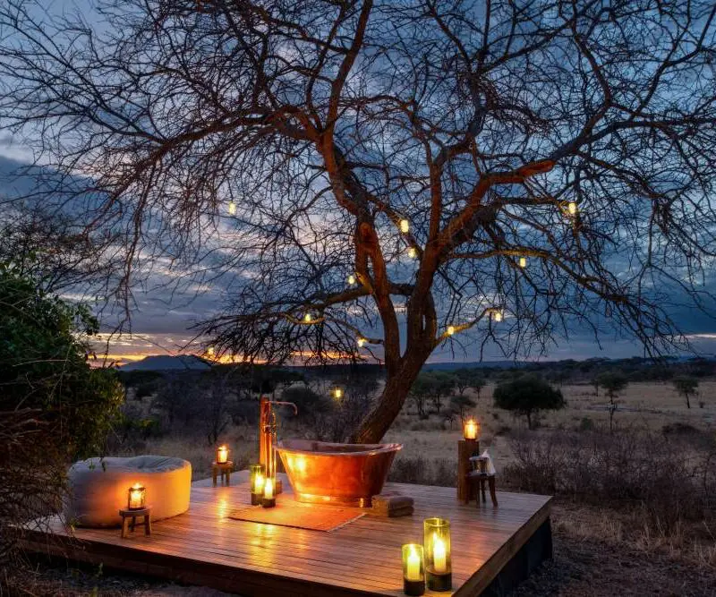 A romantic outdoor bath experience at Oliver's Camp in Tarangire National Park | All Asilia