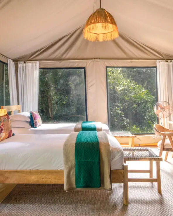 A twin set up in a suite at Rekero Camp