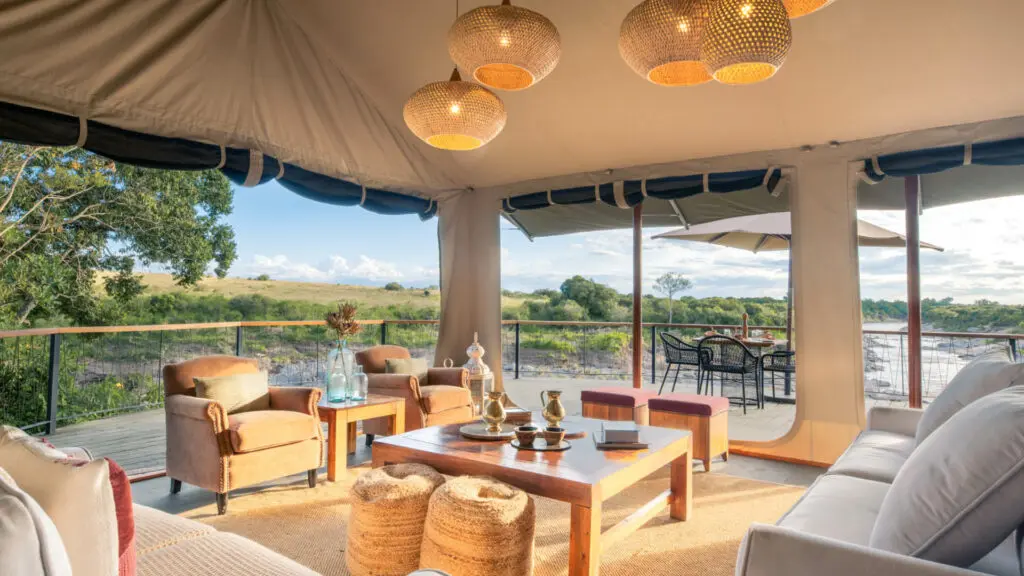 The stylish lounge area at Rekero with comfy sofas, ottomans, and a coffee table