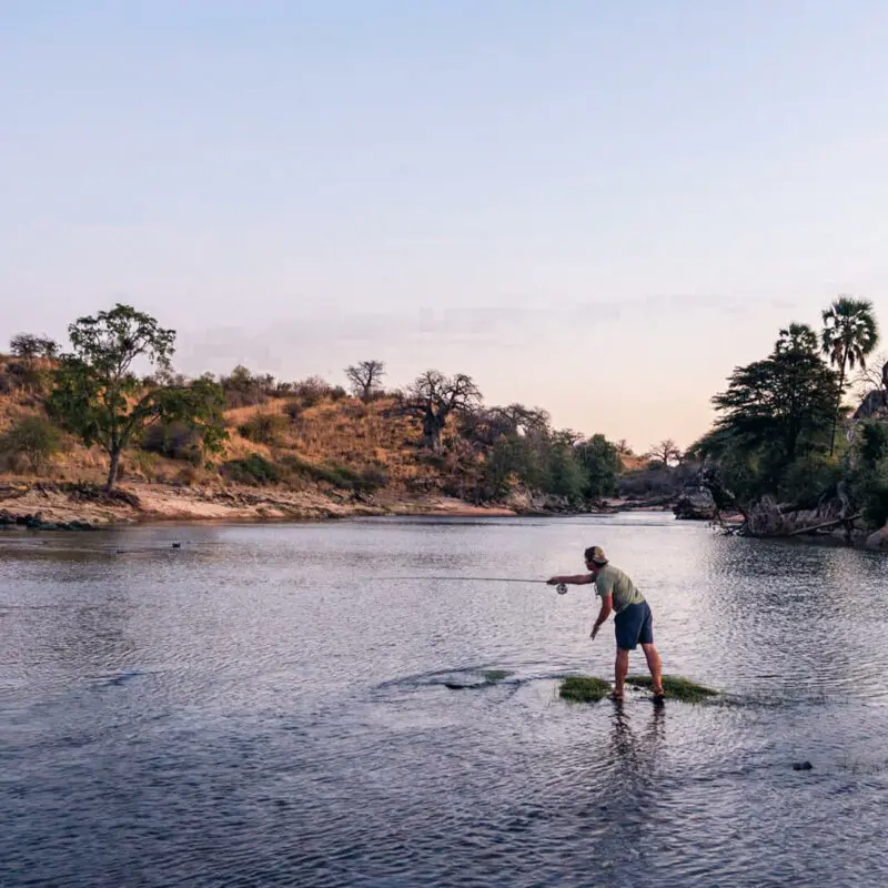 A guest throws a line out on a fishing safari