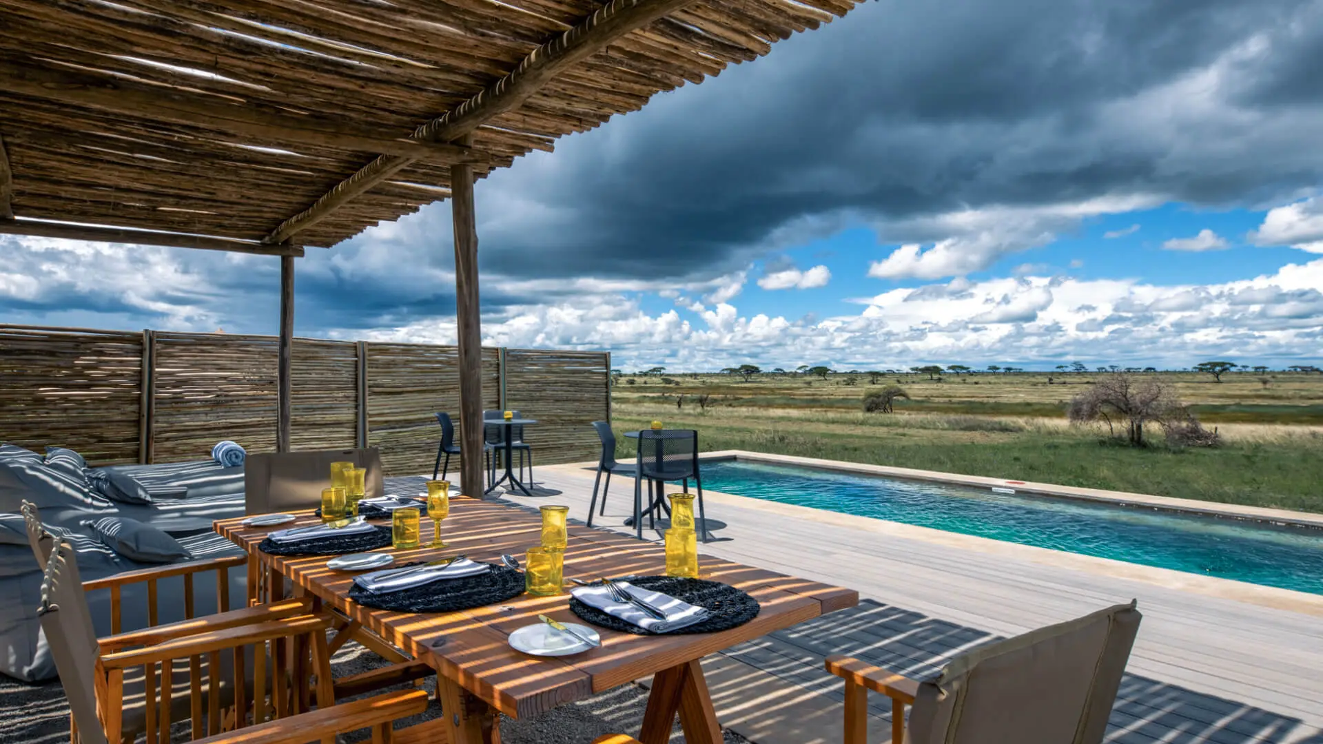 A private lunch set up beside the swimming pool