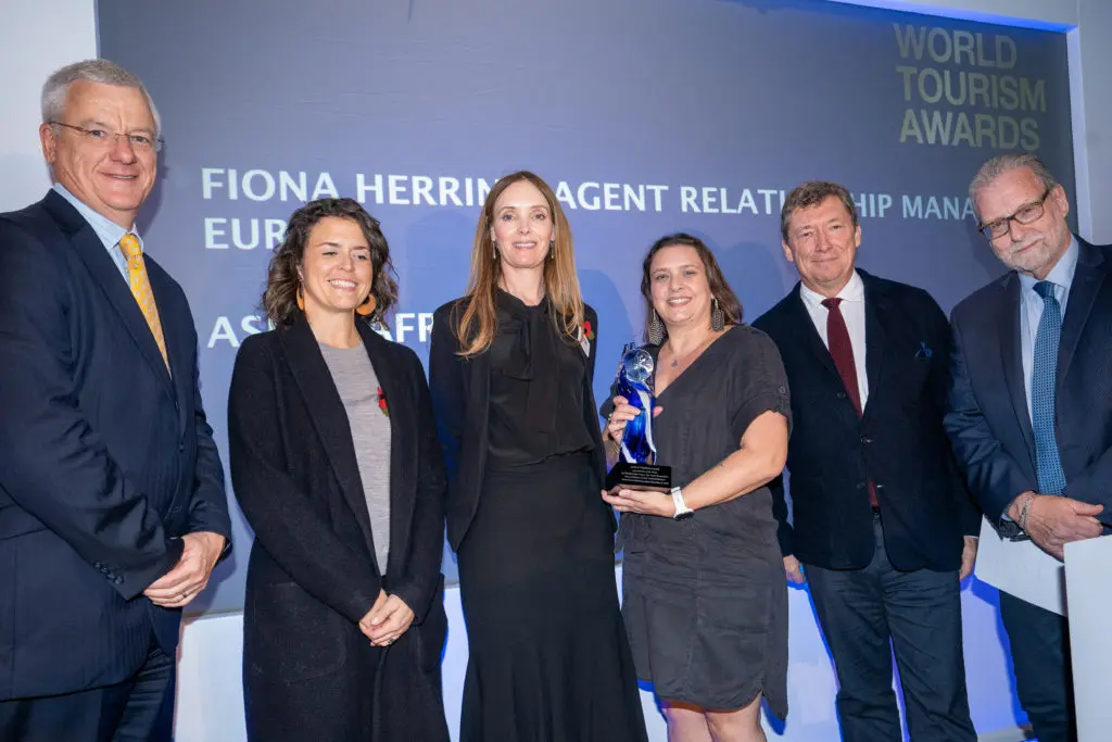 Asilia Africa team accepting the World Tourism Award