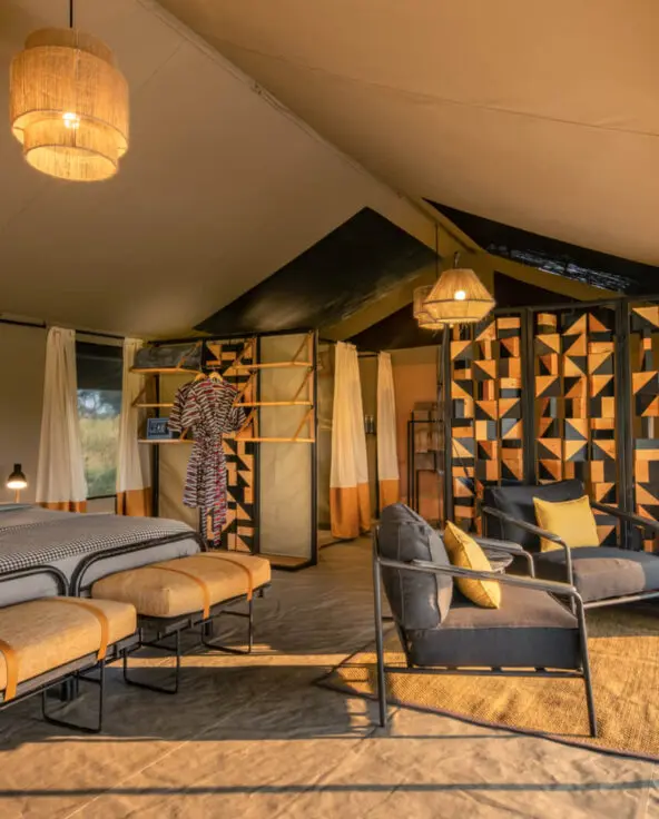 Guest tent interior view showing the bed and sitting area