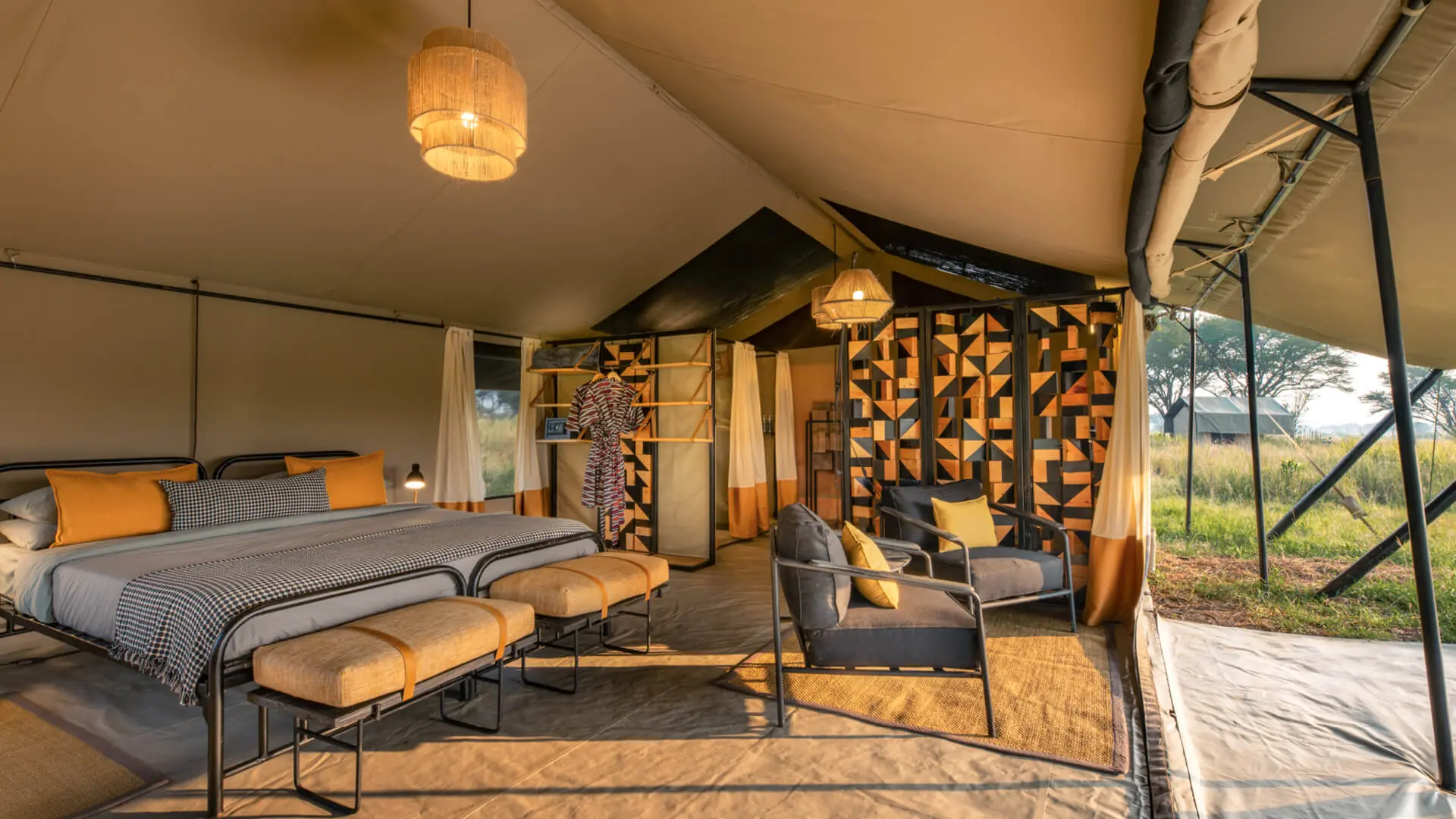 Guest tent interior view showing the bed and sitting area
