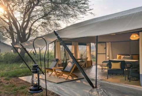 The deck area of a guest tent at Ubuntu Migration Camp