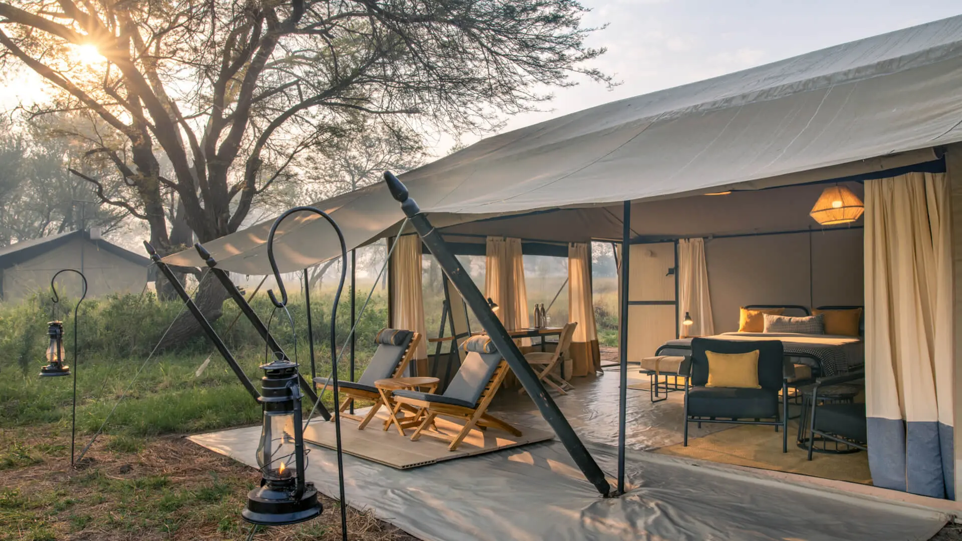 The deck area of a guest tent at Ubuntu Migration Camp