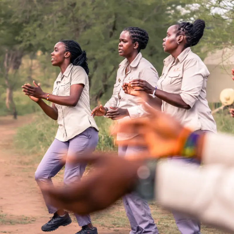 Staff dancing at Dunia Camp, Serengeti, Tanzania