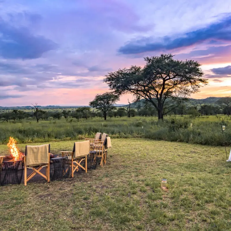 Sunset campfire at Dunia Camp, Serengeti, Tanzania
