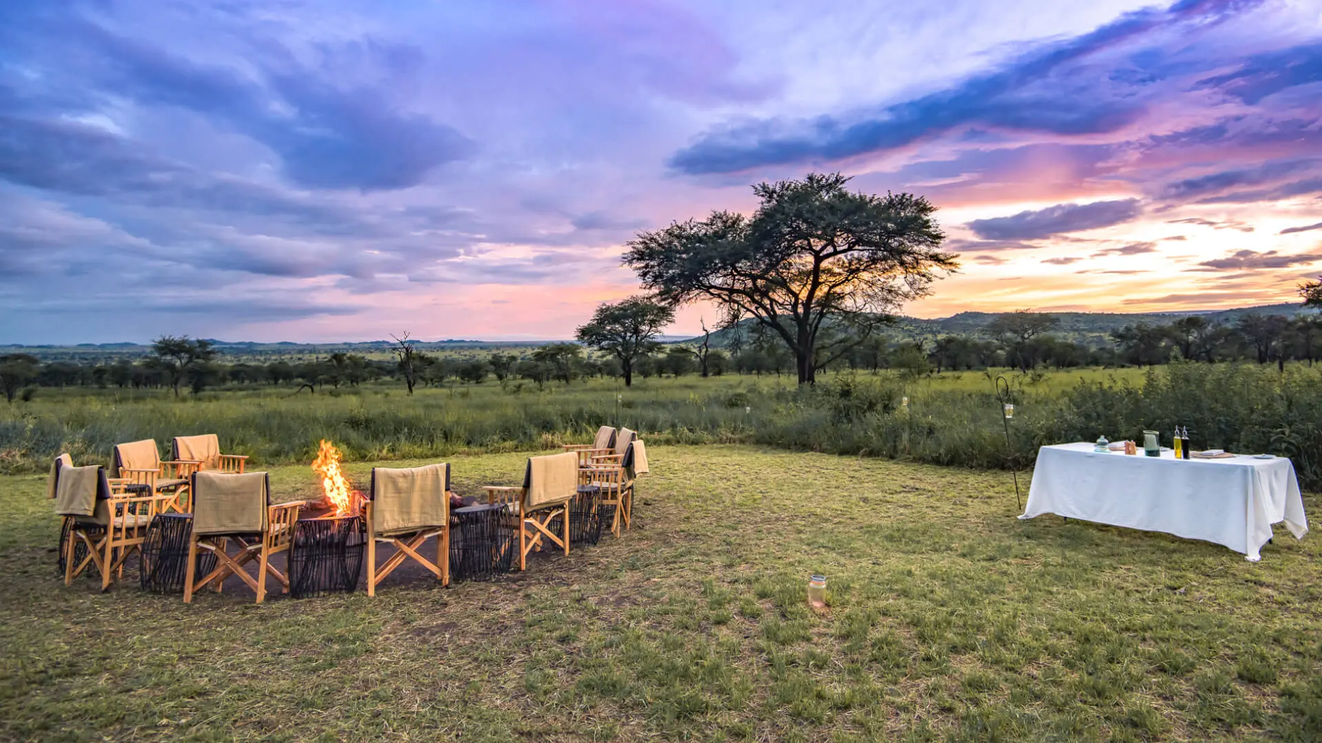 Sunset campfire at Dunia Camp, Serengeti, Tanzania
