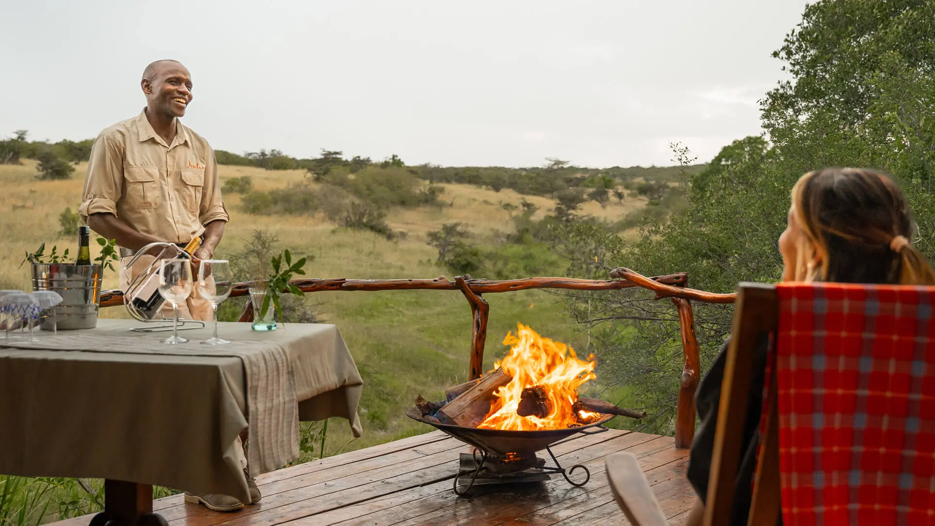 Encounter Mara Camp, sundowners around the campfire, outside deck, masai mara, kenya