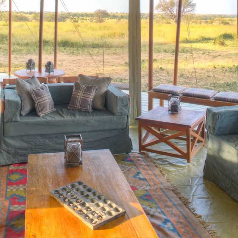 Asilia Olakira Migration Camp, guest lounge, inside main area, Serengeti National Park, Tanzania