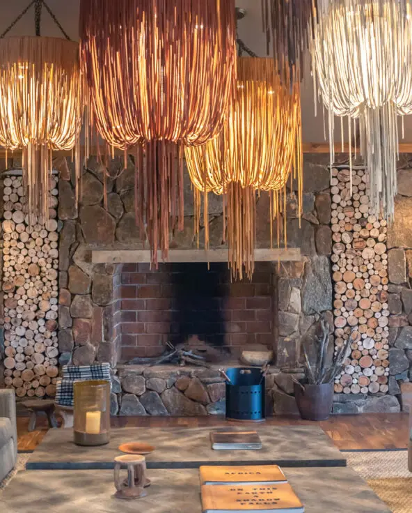 Sayari Camp, Northern Serenegeti, indoor fireplace, Lounge Area, hanging lights
