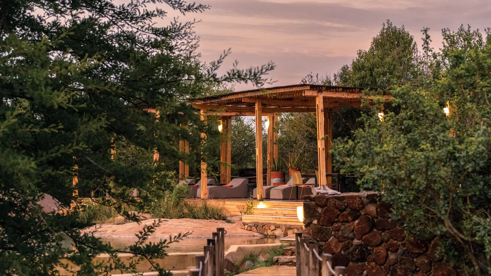 Sayari Camp, Northern Serengeti, Pool deck, walkway, between the trees