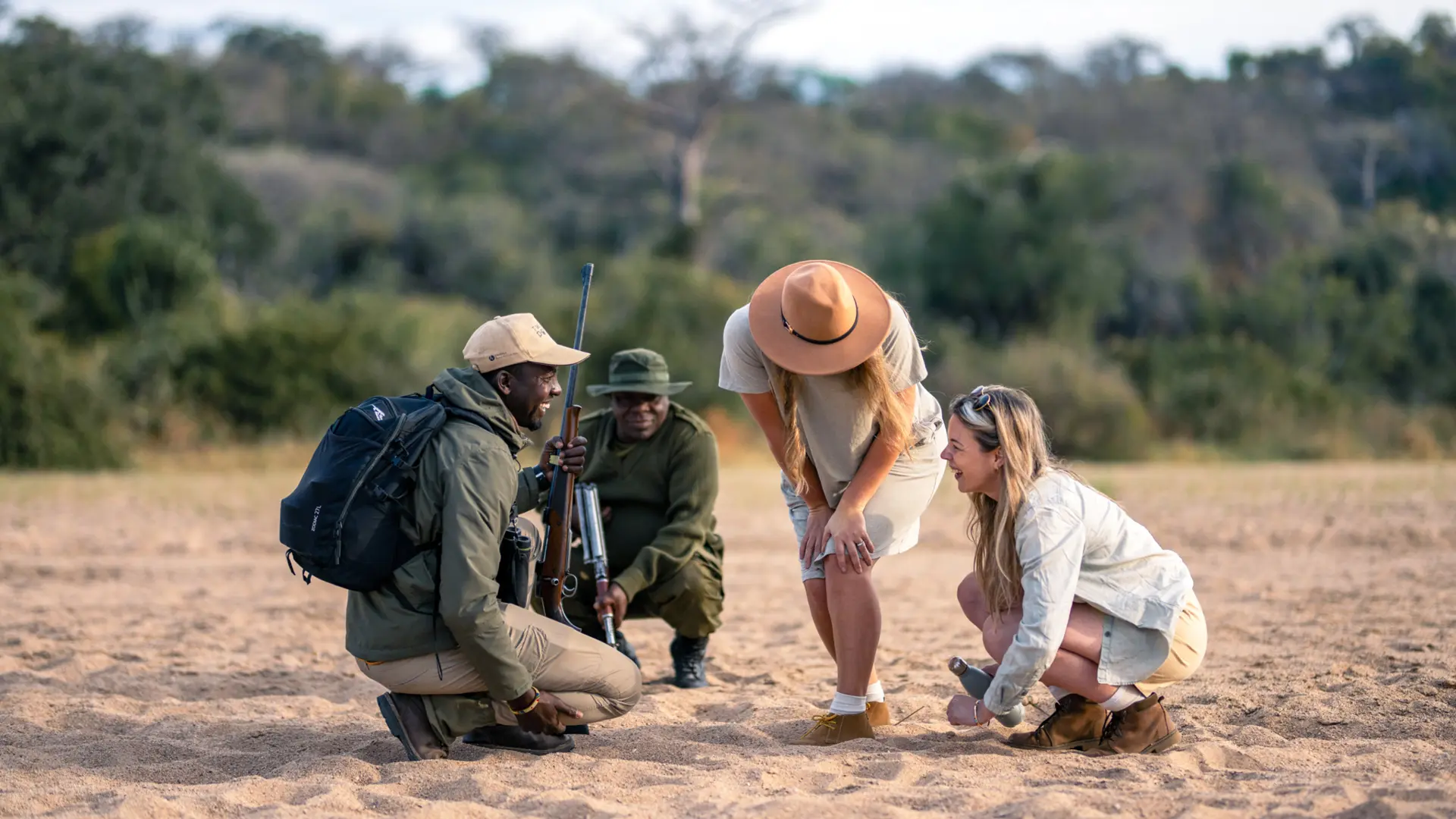 Asilia guests on a walking safari learn fascinating insights from their guides