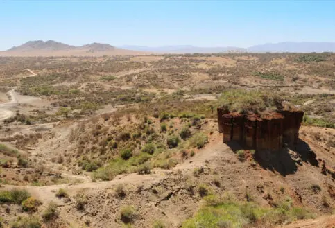 Olduvia Gorge landscape with mountains in the background