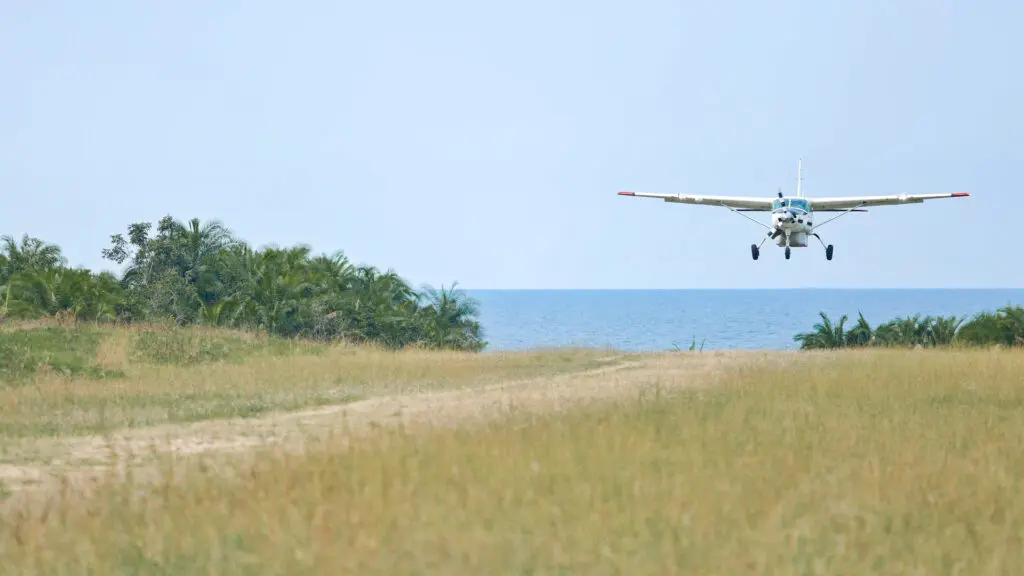 Light aircraft coming into land on Rubondo Island in northern Tanzania in East Africa