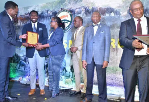 Asilia accepts the award for Best Tour Operator at the TANAPA Tourism Awards 2019.