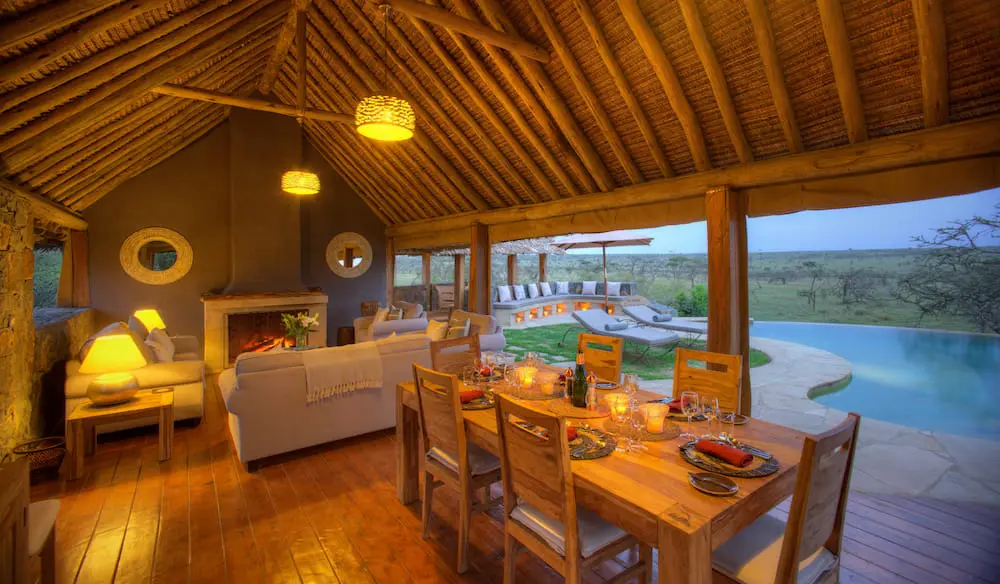 Naboisho Poolside lounge with fireplace, Mara Naboisho Conservancy.