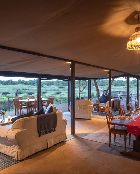 a view out from the lounge area at ol pejeta bush camp in kenya, asilia africa