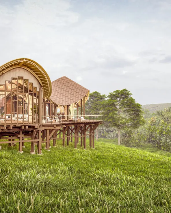 Render of the main area from the side on a grassy ledge amidst trees and greenery Erebero Hills Uganda