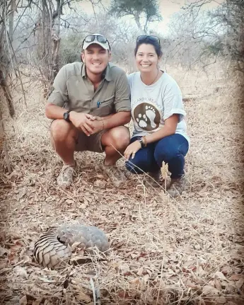 Tam and Lorenzo in Ruaha National Park at a pangolin sighting.