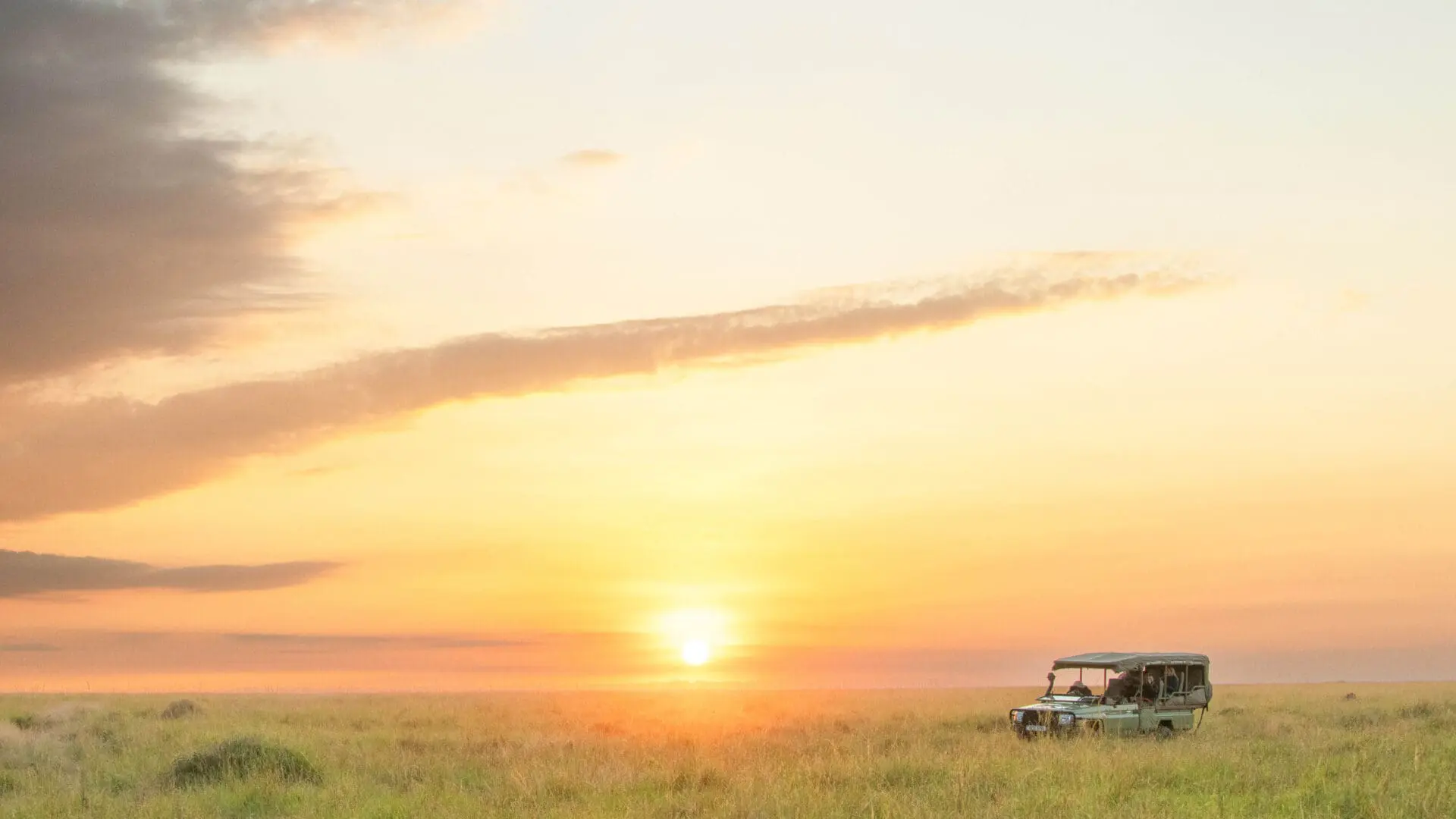 Vehicle parked for guests to enjoy the sunset in Masai Mara