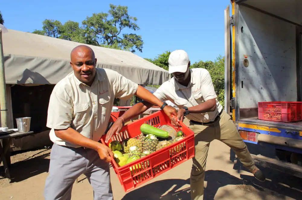 David unloading fresh produce at Kwihala Camp, Ruaha National Park, Tanzania.