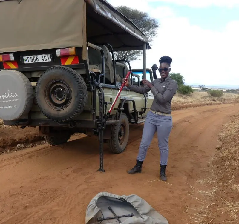 Grace demonstrates the correct use of the high lift jack, Tarangire National Park.