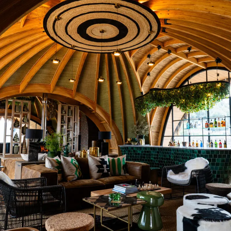 Wilderness Bisate Guest lounge and bar area interior