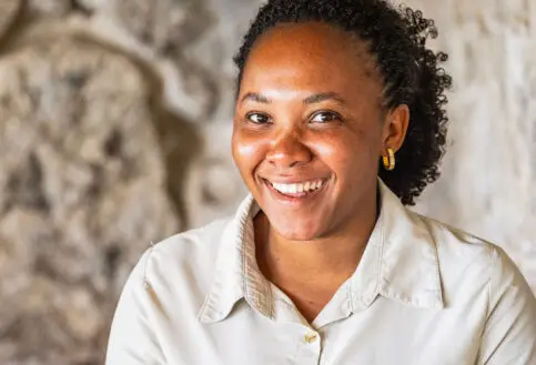 female staff smiling at the camera, namiri plains camp, tanzania, asilia africa