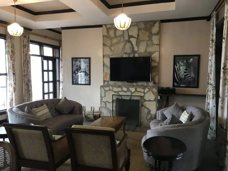 Five Volcanoes Lounge area interior with fireplace and television