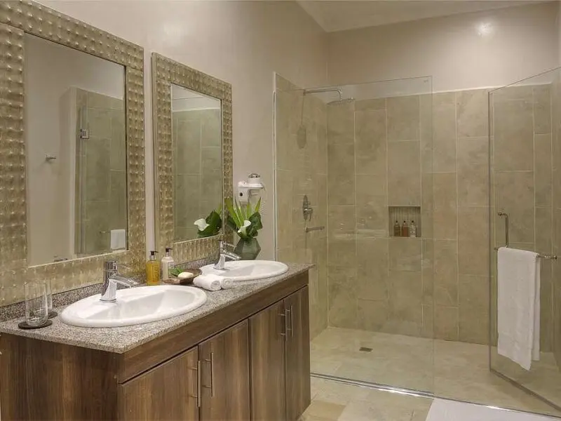 Bishop's House Guest bathroom interior with double vanity and shower