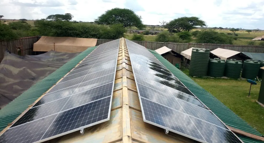 Solar panels cover a rooftop in the back-of-house of Namiri Plains, Serengeti National Park.