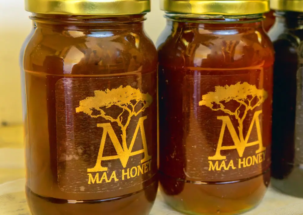 Freshly bottled and labelled honey at The Maa Trust, Kenya.