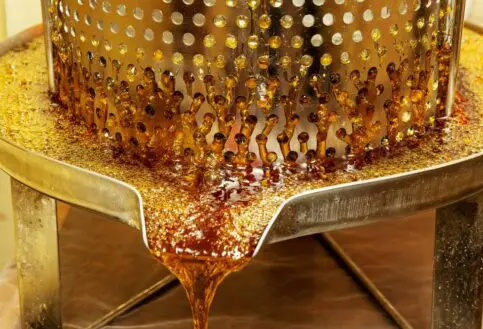 A honey press extracting honey at The Maa Trust, Kenya.