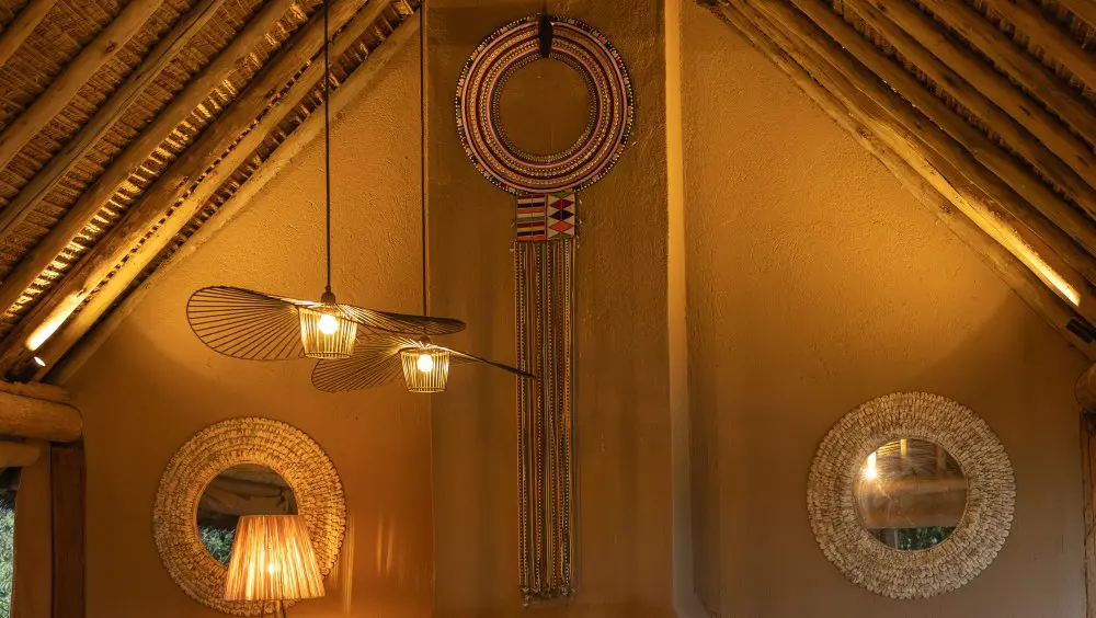 The Enkarewa hanging above the fireplace in the poolside lounge.