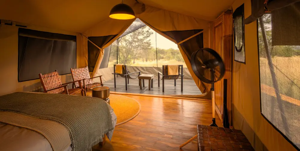 The interior of a guest tent at Olakira Migration Camp, Serengeti National Park.