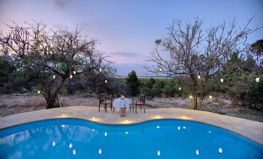 Private poolside dining at Roho ya Selous, Tanzania