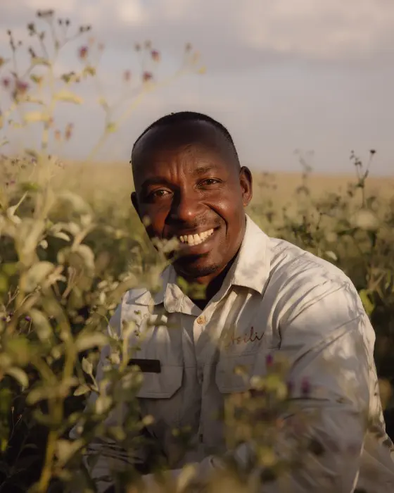 Godbless smiling and relaxed, Serengeti, Tanzania.