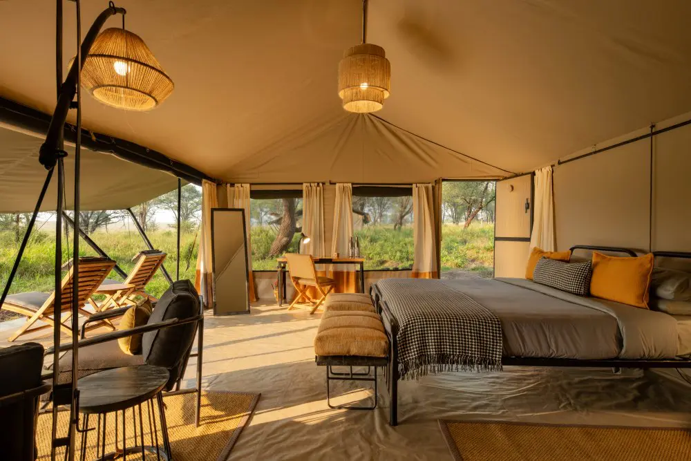 The interior of a guest tent at Ubuntu Migration Camp, Serengeti National Park.