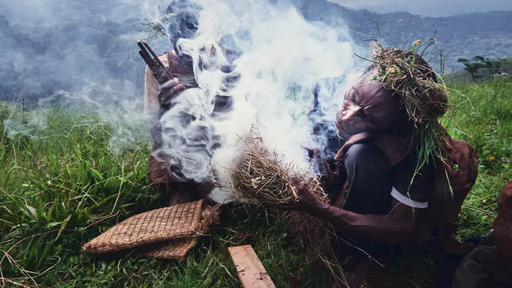 Batwa Man Making Fire Uganda