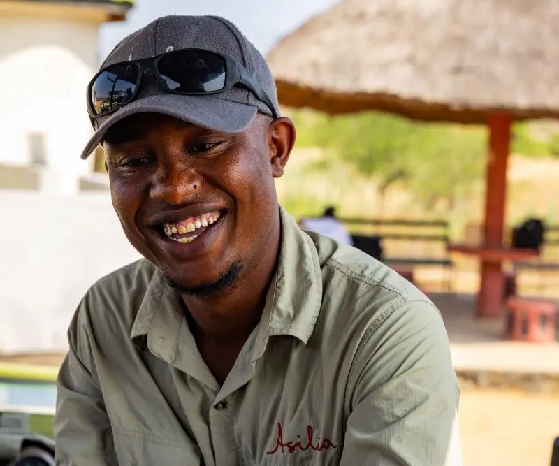 A smiling Asilia guide, Ruaha National Park, Tanzania.