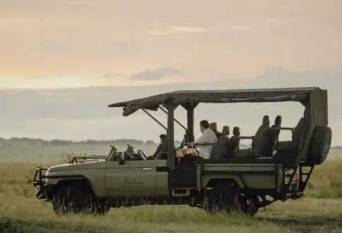 An Asilia e-vehicle, Maasai Mara, Kenya.
