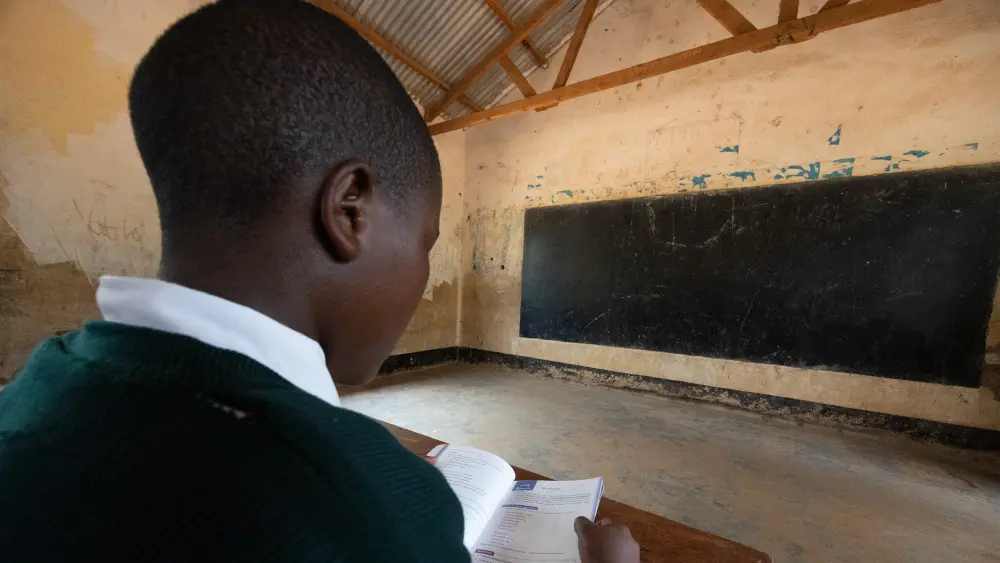 Kelvin in his classroom, Muganza, Tanzania.