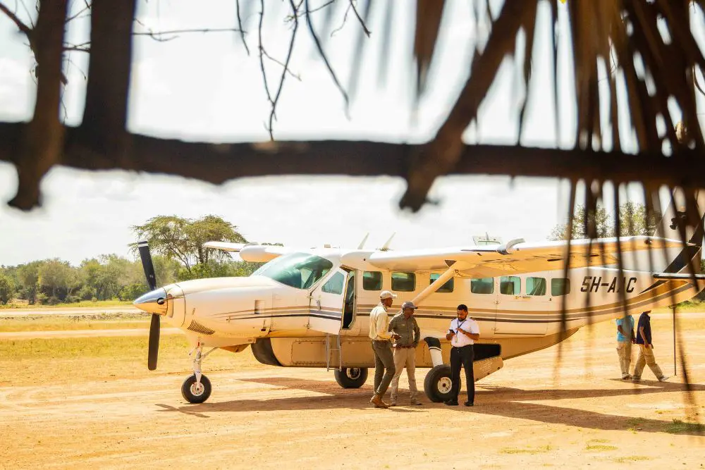A bush plane landing on the air strip in the Ruaha National Park, Tanzania.