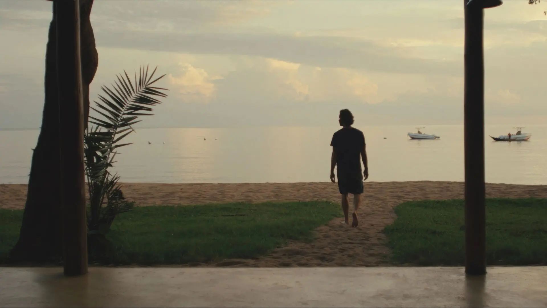 Asilia guest enjoying a stroll on the sandy shores of Rubondo Island