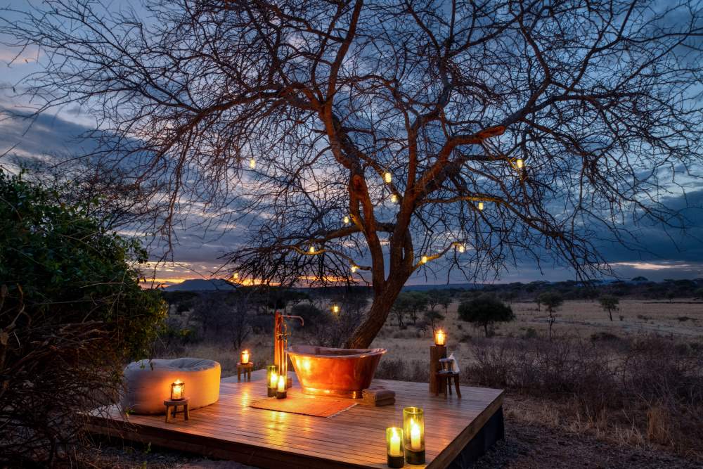 A romantic outdoor bath experience at Oliver's Camp in Tarangire National Park | All Asilia